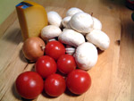 Tomaten, Zwiebel, Champignons und Käse